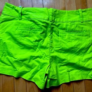 Yellow/green color shorts. Size 14. Signature fit.